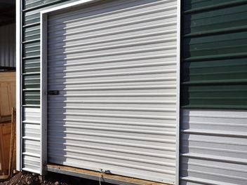 A roll-up door fitted in a finished wall