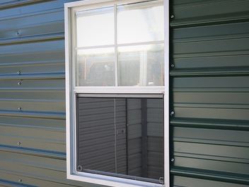 A window set into a panelled wall